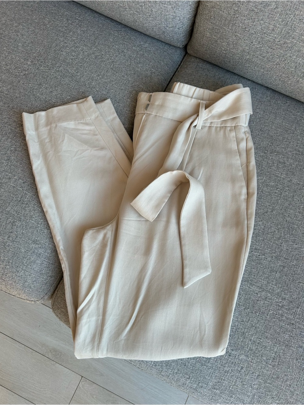 beige paper bag style trousers